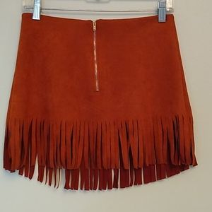 Kittenish fringe skirt